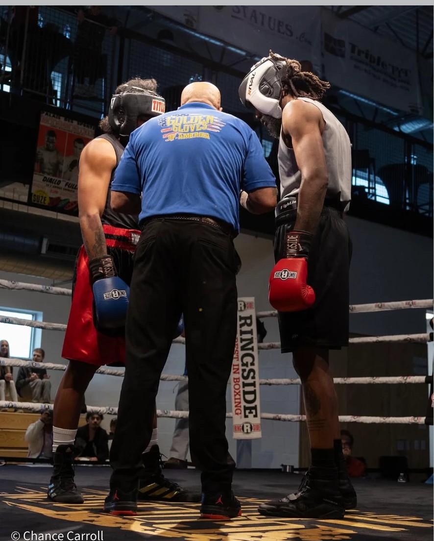 Jayy Klipsz receiving final instructions in the ring corner before a bout