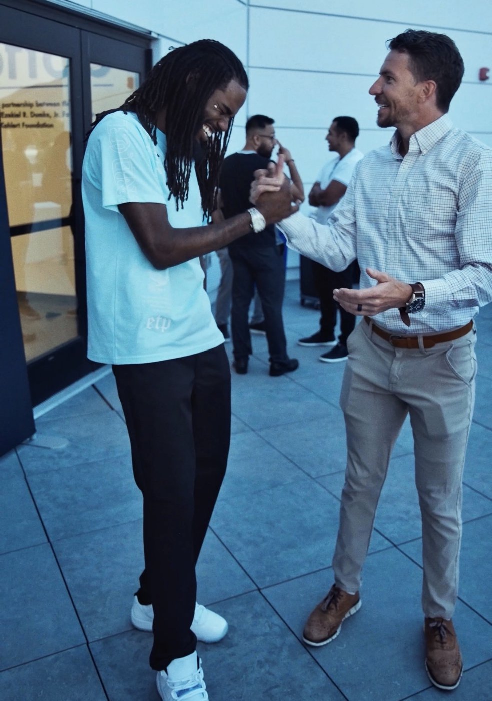 Jayy Klipsz and entrepreneurs networking together in a candid group photograph